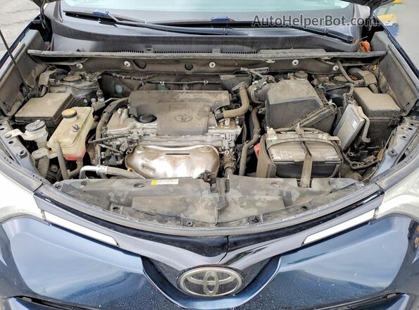 2T3BFREVXJW764905 2018 TOYOTA RAV4 Blue Rear interior view