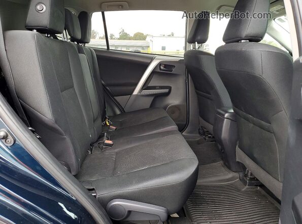2T3BFREVXJW764905 2018 TOYOTA RAV4 Blue Rear seats view