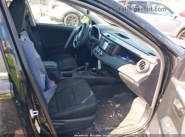 2T3BFREVXJW774852 2018 TOYOTA RAV4 Black Vista interior delantera