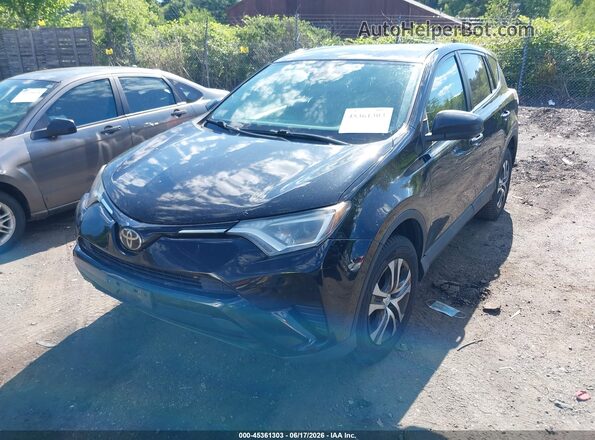 2T3BFREVXJW774852 2018 TOYOTA RAV4 Black Vista tres cuartos delantera izquierda