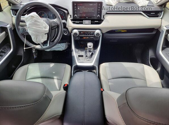 2T3C1RFV7KC008873 2019 TOYOTA RAV4 Серебряный Вид панели приборов