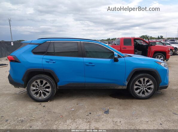 2T3C1RFV7MW172965 2021 TOYOTA RAV4 Blue Սալոնի հետևի տեսք
