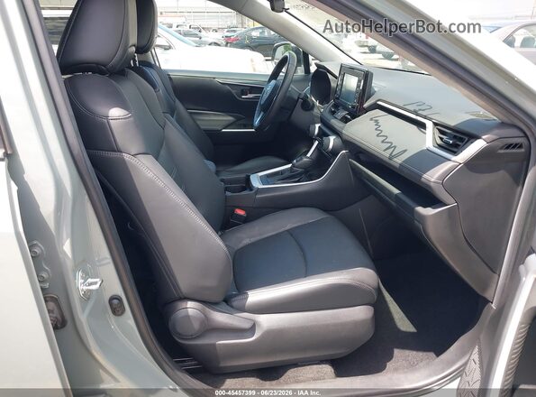 2T3C1RFV8MW183134 2021 TOYOTA RAV4 Teal Widok wnętrza z przodu