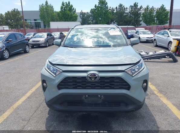 2T3C1RFV8MW183134 2021 TOYOTA RAV4 Teal Widok wnętrza z tyłu