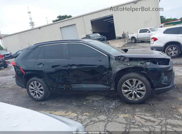 2T3C1RFV8RC261291 2024 TOYOTA RAV4 Black Սալոնի հետևի տեսք