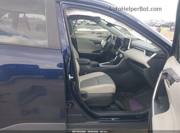2T3C1RFV8RW302985 2024 TOYOTA RAV4 Blue Front interior view