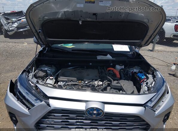 2T3D6RFV9RW079975 2024 TOYOTA RAV4 HYBRID Silver Rear view