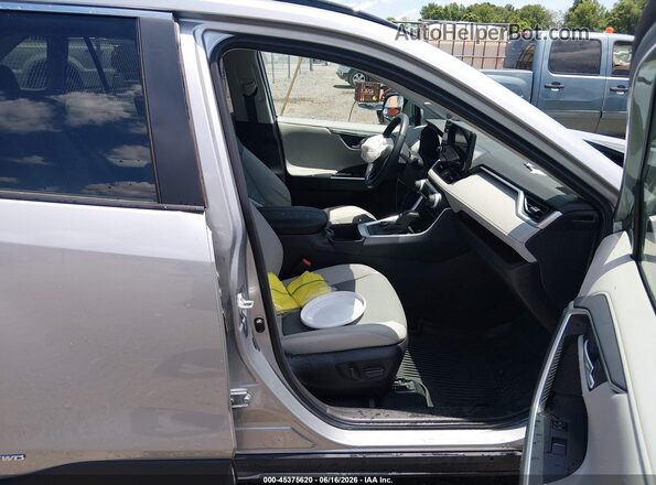 2T3D6RFV9RW079975 2024 TOYOTA RAV4 HYBRID Silver Front interior view