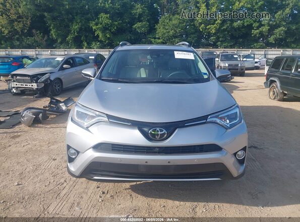 2T3DFREV0GW470284 2016 TOYOTA RAV4 Серебряный 