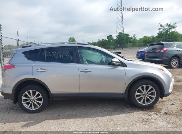 2T3DFREV0HW633047 2017 TOYOTA RAV4 Silver Vista interior trasera