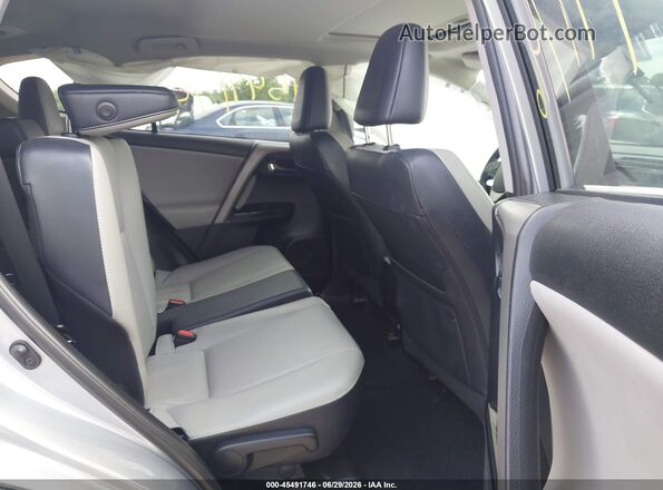 2T3DFREV0HW633047 2017 TOYOTA RAV4 Silver Vista de la etiqueta del VIN