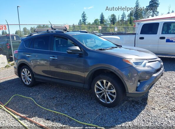 2T3DFREV1HW562957 2017 TOYOTA RAV4 Gray Вид задньої частини салону