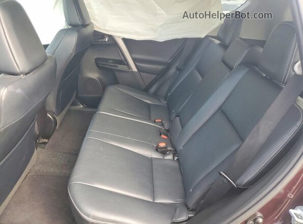 2T3DFREV3HW545187 2017 TOYOTA RAV4 Burgundy Widok wnętrza z tyłu