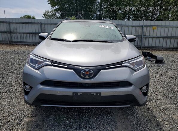2T3DFREV3JW762387 2018 TOYOTA RAV4 Silver Front view