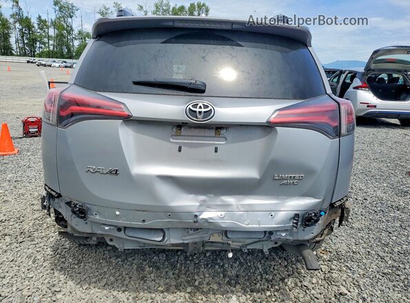 2T3DFREV3JW762387 2018 TOYOTA RAV4 Silver Rear view