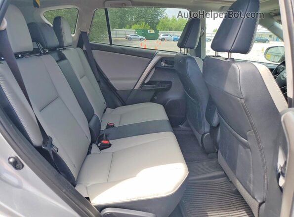 2T3DFREV3JW762387 2018 TOYOTA RAV4 Silver Rear interior view