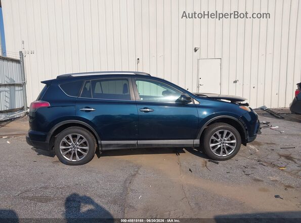 2T3DFREV4HW549944 2017 TOYOTA RAV4 Green Вид задньої частини салону