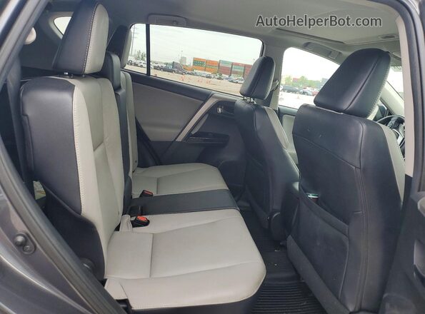 2T3DFREV4HW576402 2017 TOYOTA RAV4 Charcoal Rear interior view