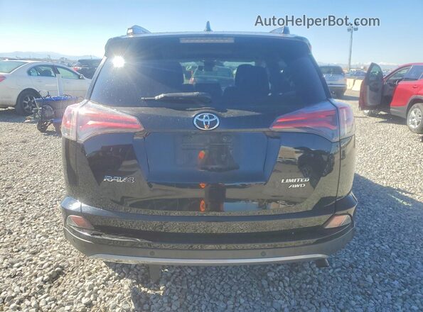 2T3DFREV4JW717426 2018 TOYOTA RAV4 Black Rear view