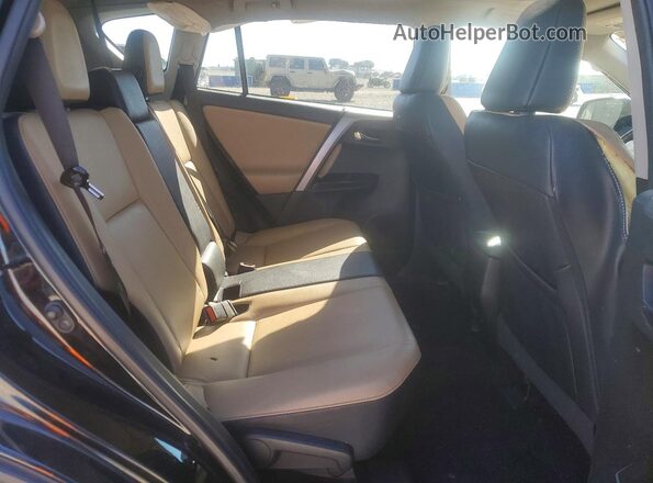 2T3DFREV4JW717426 2018 TOYOTA RAV4 Black Rear interior view