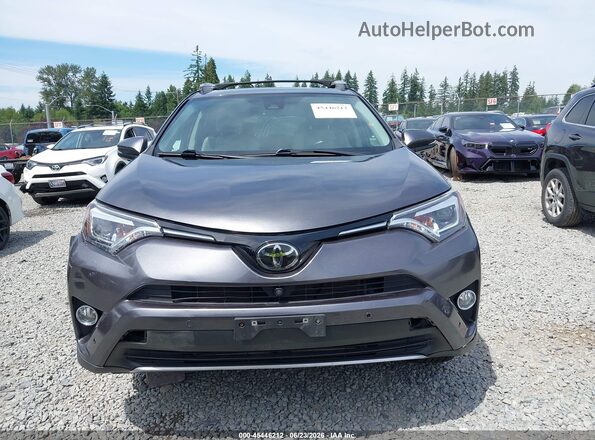 2T3DFREV5HW602232 2017 TOYOTA RAV4 Gray Vista interior trasera