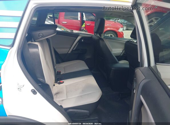 2T3DFREV9HW584110 2017 TOYOTA RAV4 White VIN sticker view