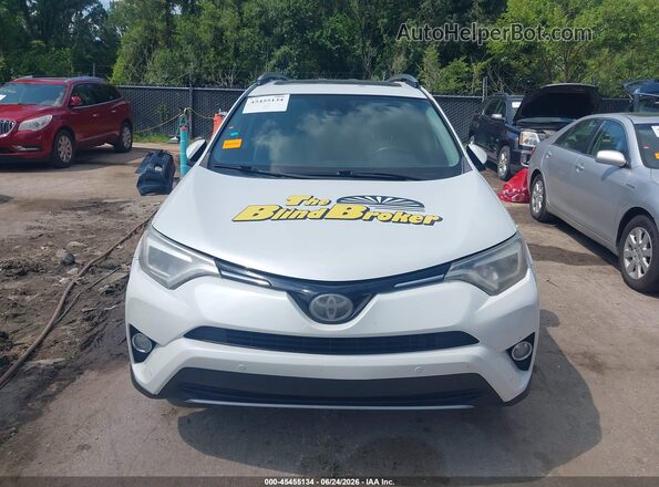 2T3DFREV9HW584110 2017 TOYOTA RAV4 White Rear interior view