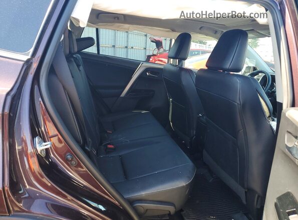 2T3DFREVXHW684183 2017 TOYOTA RAV4 Burgundy Rear interior view