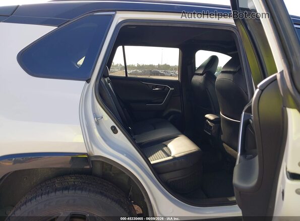2T3E6RFV3NW031774 2022 TOYOTA RAV4 HYBRID White Vista de la etiqueta del VIN