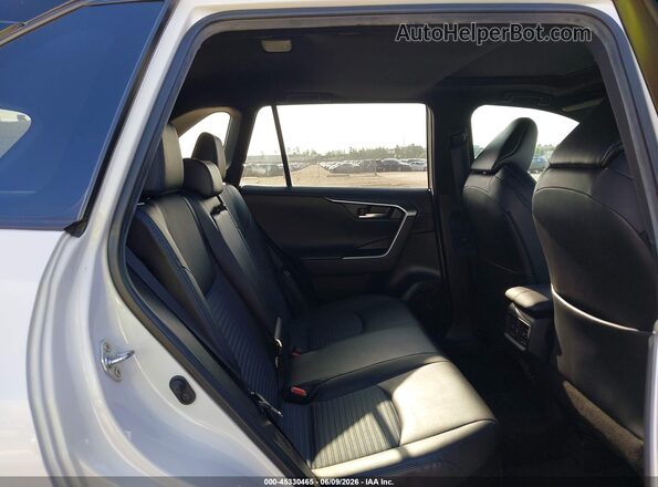 2T3E6RFV3NW031774 2022 TOYOTA RAV4 HYBRID White Vista interior trasera