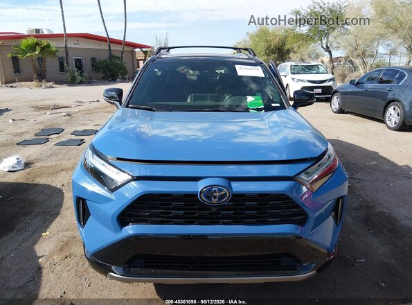 2T3E6RFV3NW032388 2022 TOYOTA RAV4 HYBRID Blue Вид панелі приладів