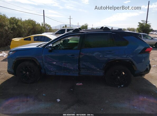 2T3E6RFV3NW032388 2022 TOYOTA RAV4 HYBRID Blue Вид задньої частини салону