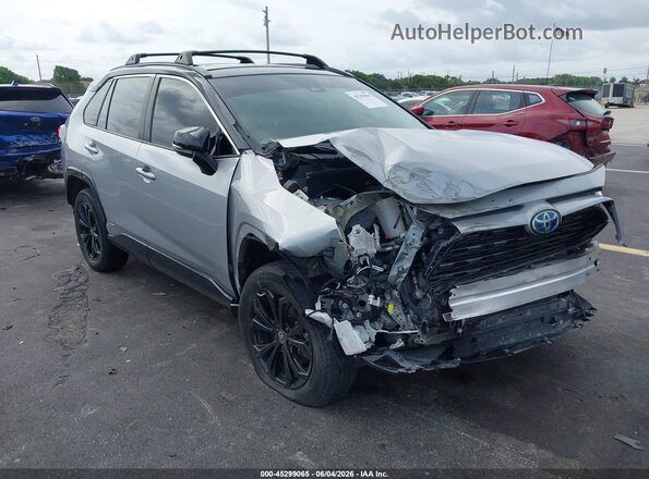 2T3E6RFV3NW035730 2022 TOYOTA RAV4 HYBRID Silver Front view