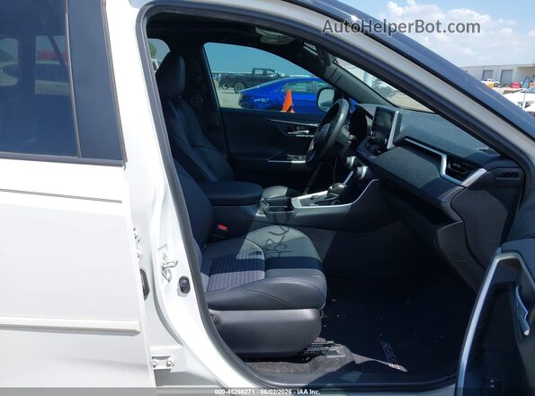 2T3E6RFV4MW014528 2021 TOYOTA RAV4 HYBRID White Widok wnętrza z przodu