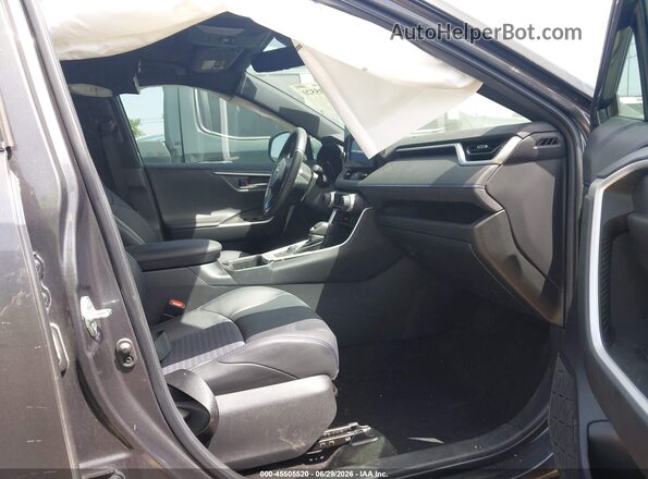 2T3E6RFV4PW038042 2023 TOYOTA RAV4 HYBRID Gray Vista interior delantera