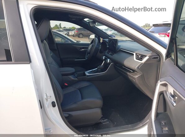 2T3E6RFV5RW080447 2024 TOYOTA RAV4 HYBRID White Front interior view