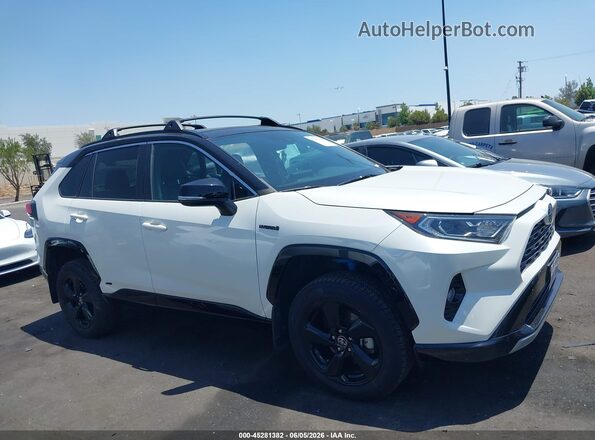 2T3E6RFV9MW025170 2021 TOYOTA RAV4 HYBRID White Rear interior view