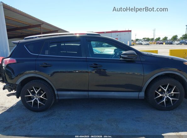 2T3JFREV1GW456087 2016 TOYOTA RAV4 Black Вид задньої частини салону