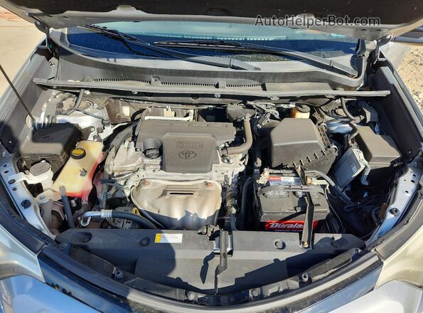 2T3JFREV4GW439574 2016 TOYOTA RAV4 Серебряный 