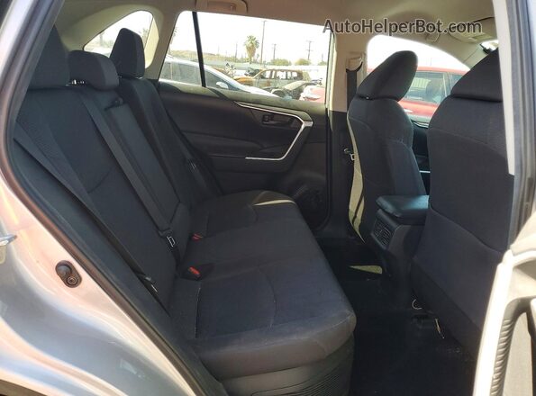 2T3LWRFV9KW045486 2019 TOYOTA RAV4 Silver Rear seats view