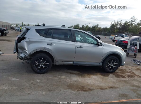 2T3NFREV0GW257162 2016 TOYOTA RAV4 Gray Սալոնի հետևի տեսք