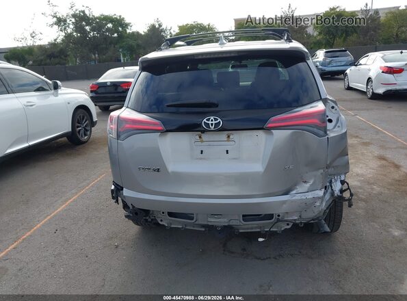 2T3NFREV0GW257162 2016 TOYOTA RAV4 Gray 