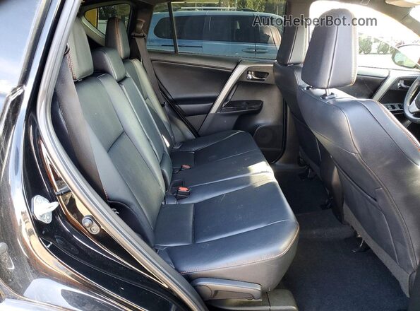2T3NFREV2GW252240 2016 TOYOTA RAV4 Black Rear interior view
