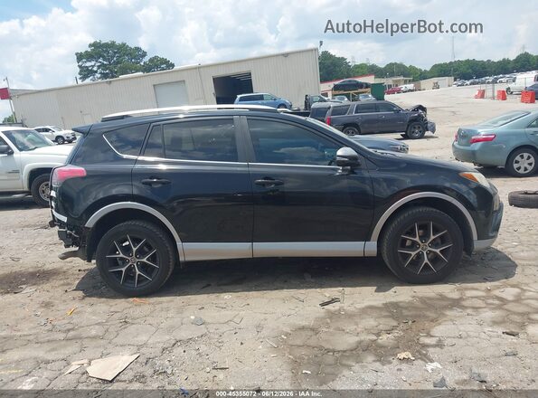 2T3NFREV7HW358667 2017 TOYOTA RAV4 Black Widok wnętrza z tyłu