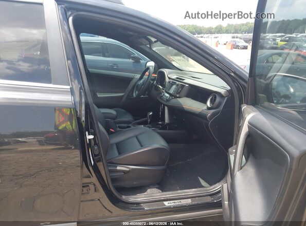 2T3NFREV7HW358667 2017 TOYOTA RAV4 Black Widok wnętrza z przodu