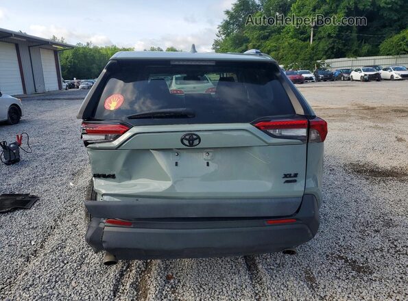 2T3P1RFV7KW076915 2019 TOYOTA RAV4 Turquoise Rear view
