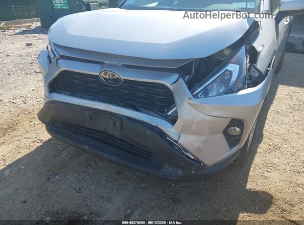 2T3P1RFVXKW063737 2019 TOYOTA RAV4 Серебряный Вид спереди