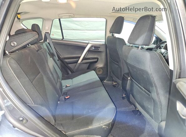 2T3RFREV0GW464054 2016 TOYOTA RAV4 Gray Вид задньої частини салону