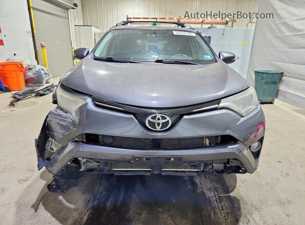 2T3RFREV0GW464054 2016 TOYOTA RAV4 Gray Вид спереду