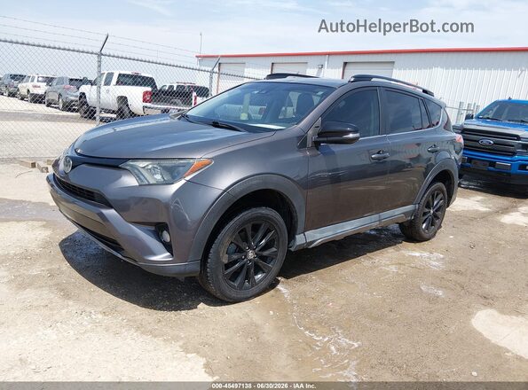 2T3RFREV0JW710317 2018 TOYOTA RAV4 Gray Przód lewy